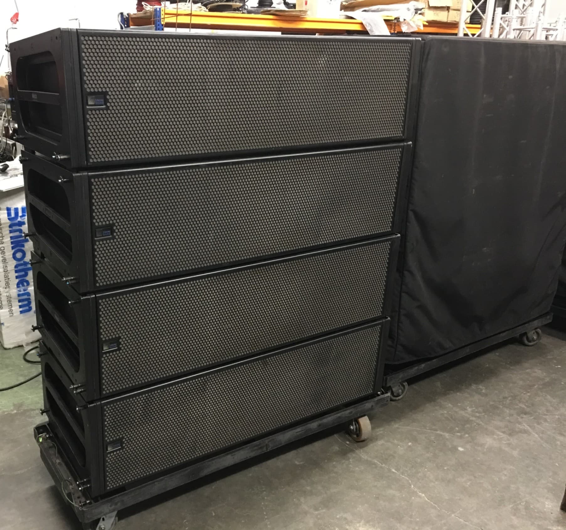 Lot of Meyer Sound MILO line array speakers
